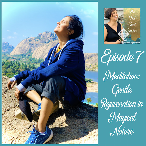 Side view of Susmitha Subbaraju, sitting on a hillside and facing the sky. Big smile on face. Rocks and water far away in the background scenery. The Feel Good Factor Episode 7. Meditation: Gentle Rejuvenation in Magical Nature.
