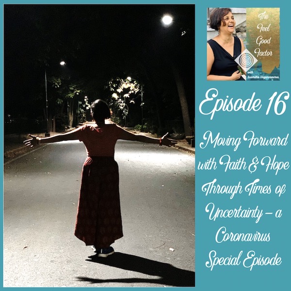 Susmitha Subbaraju standing on an empty road, facing away from camera. Hands spread out wide. Dark background with light shining on some parts. The Feel Good Factor with Susmitha Veganosaurus. Episode 16. Moving Forward with Faith & Hope Through Times of Uncertainty - a Coronavirus Special Episode about being positive during the lockdown.