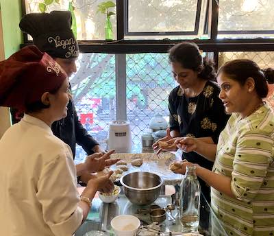 Chef Susmitha Subbaraju and Chef Ram Khatiwada of Carrots Restaurant, Bangalore, teaching a vegan baking workshop.