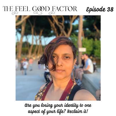 The Feel Good Factor Podcast with Susmitha Veganosaurus, Episode 38. Portrait, close up of woman with short hair, seriously looking at the camera. Sun shining on her face, blurred trees in the background. Are you losing your identity to one aspect of your life? Reclaim it!