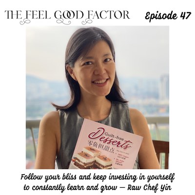 The Feel Good Factor episode 47. Follow your bliss and keep investing in yourself to constantly learn and grow – Raw Chef Yin. Asian woman chef holding her recipe book of raw vegan desserts and smiling at the camera.