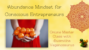 Abundance mindset for conscious entrepreneurs. Online master class with Susmitha Veganosaurus. Woman holding lots of oranges in her hands, close up image. Mandala design. Veganosaurus logo.