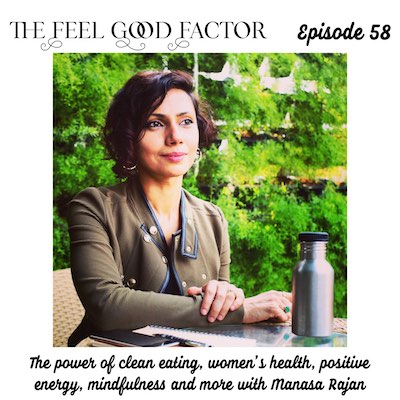 The Feel Good Factor, episode 58. Short haired Indian lady, holistic health coach, sitting at a table and looking away into the distance with a small, confident smile. The power of clean eating, women’s health, positive energy, mindfulness and more with Manasa Rajan.