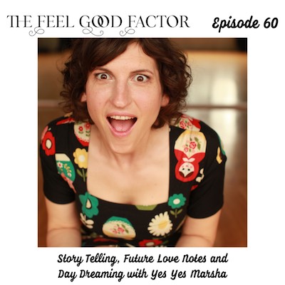 The Feel Good Factor, episode 60. Close up of Marsha Shandur, short haired caucasian woman, expressive face full of life, dress has flower and Matryoshka Dolls printed on it. She looks very excited about something. Mouth open, smiling eyes, eyebrows raised. Story Telling, Future Love Notes and Day Dreaming with Yes Yes Marsha