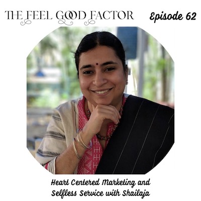 The Feel Good Factor, episode 62. Shailaja Vishwanath, Indian lady with bindi, wearing traditional clothes, smiling at the camera, hand under her chin. Heart Centered Marketing and Selfless Service with Shailaja.