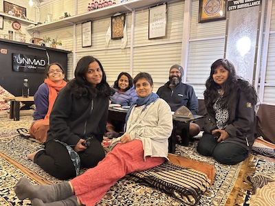 Friendly community at The Unmad Cafe, Dharamkot.