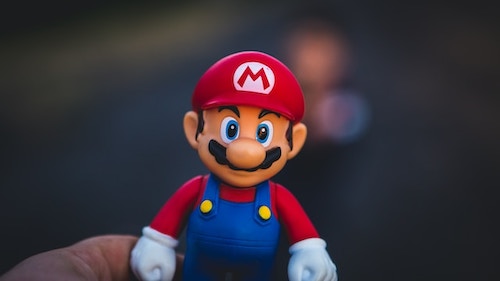 Tiny Super Mario to represent a super fan of your brand or business