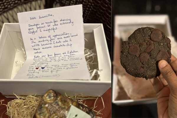 Left: box with handwritten letter. Right: vegan black sesame choco chip cookie from Green-ish whole foods plant based bakery held up to camera.
