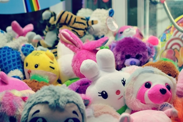 Stuffed toys piled together.