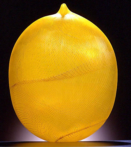 Artistice, lemon shaped sculpture appeares like there's a glow from within. Setting an intention in the morning keeps you glowing from within through the day.